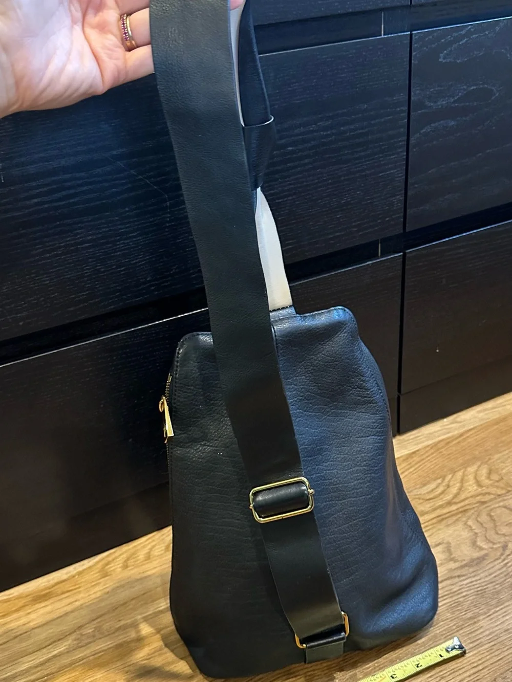 Vince Camuto Black Leather sling Backpack with Gold Accent